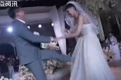 小舅子穿婚纱假扮新娘亲新郎 被发现后全场笑喷